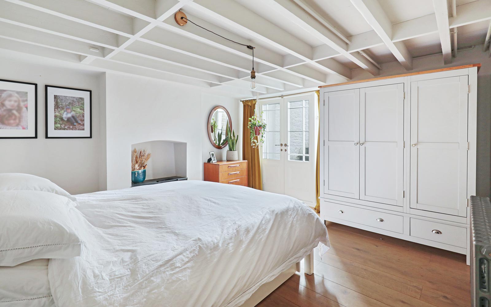 large bedroom with garden access